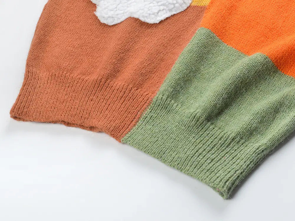 Colorblock knit Ladies Rainbow Cloud Short Sweater in orange, green, and white patches