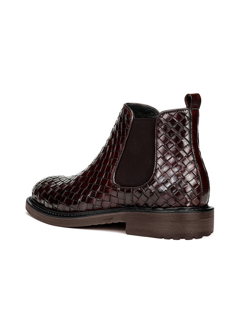 Brown woven pattern short boots with chunky sole for stylish men’s footwear.