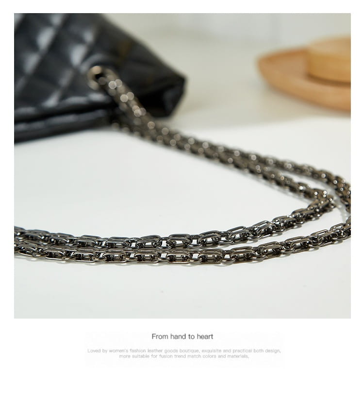 Metal chain necklace featuring linked rectangular segments for a shimmering chain strap.