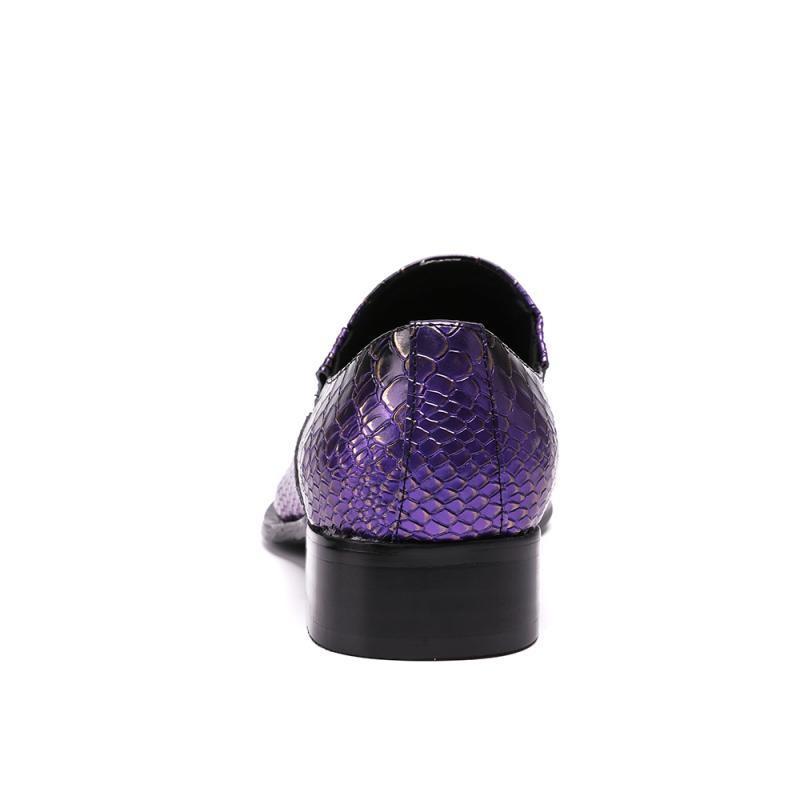 Purple leather crocodile design loafer with metal toe caps and a sleek black sole.