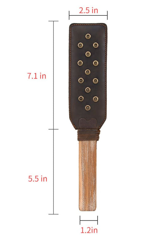 Wooden-handled leather paddle with metal studs.