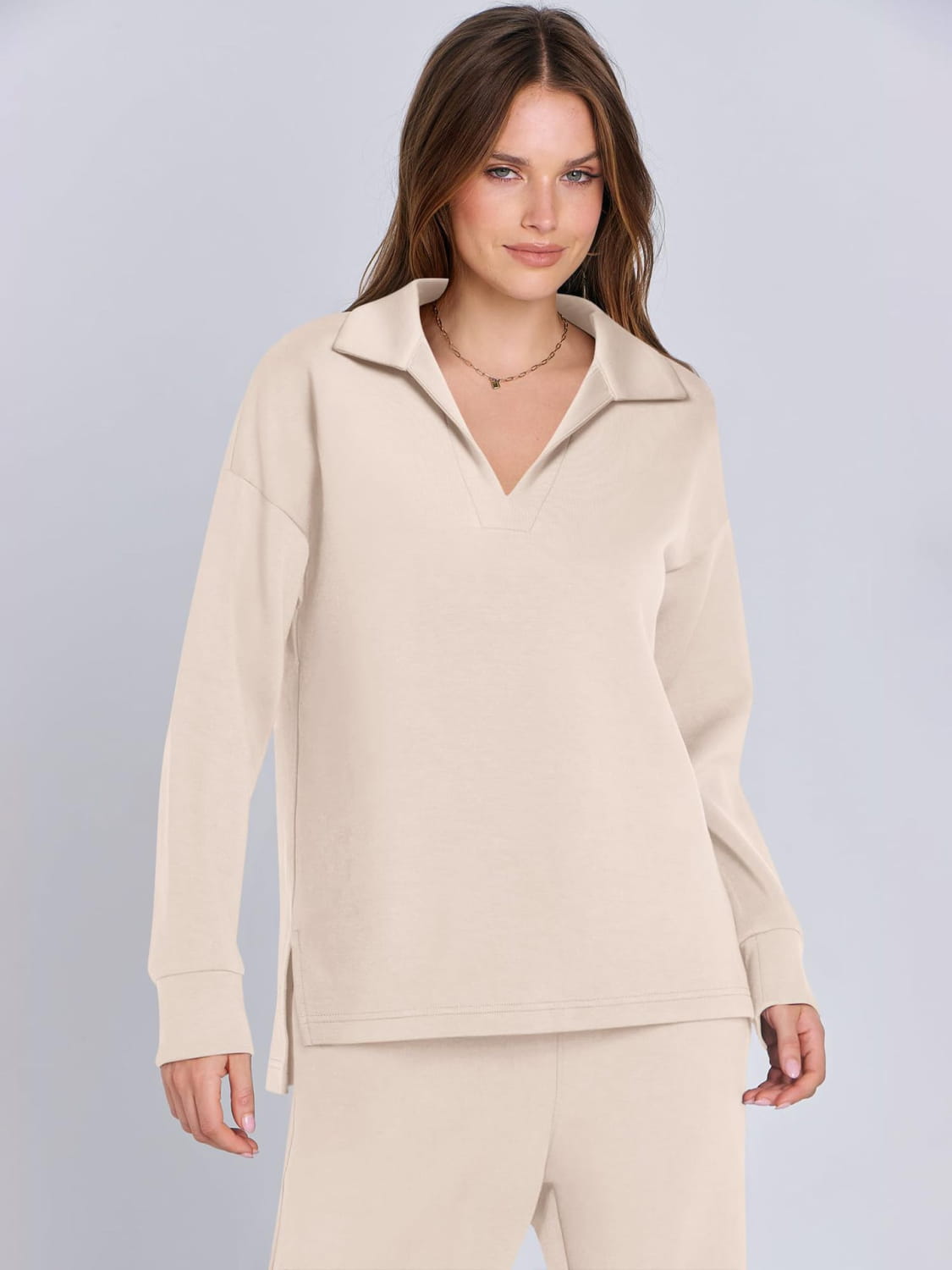 Cream-colored quarter-zip pullover sweater for ladies two piece casual outfit set.