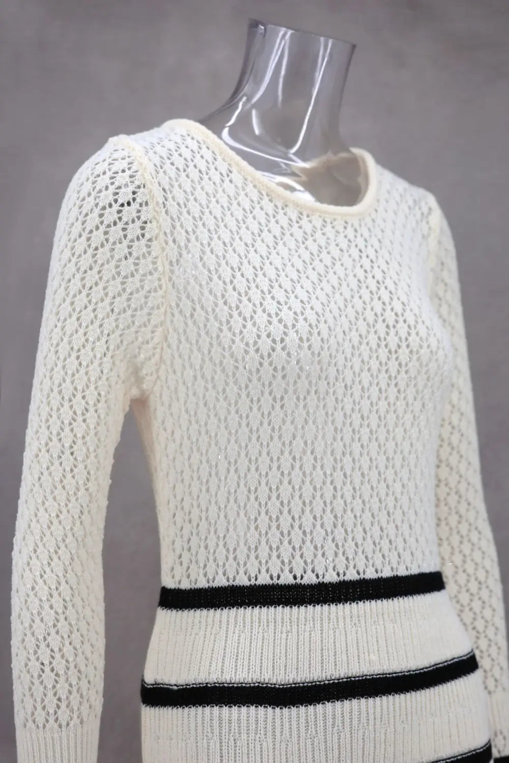 White knit sweater with black stripes perfect for a stylish ladies knitted dress slim fit.