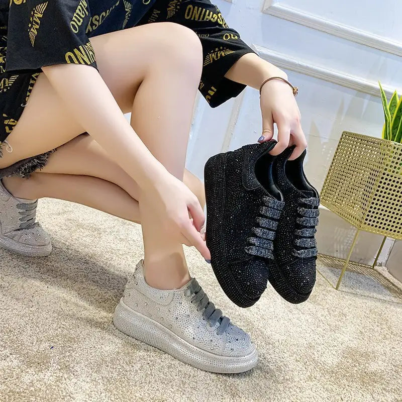 Sparkly black and silver rhinestone bling sneakers with thick sole lace for stylish leisure.