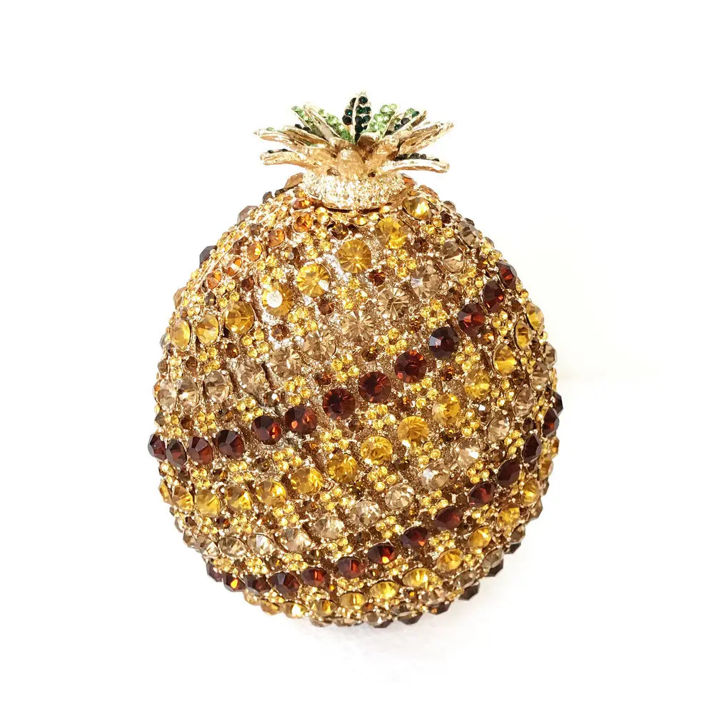 Glittering jeweled pineapple brooch on a Bejeweled Pineapple Shaped Crystal Diamante Banquet Bag