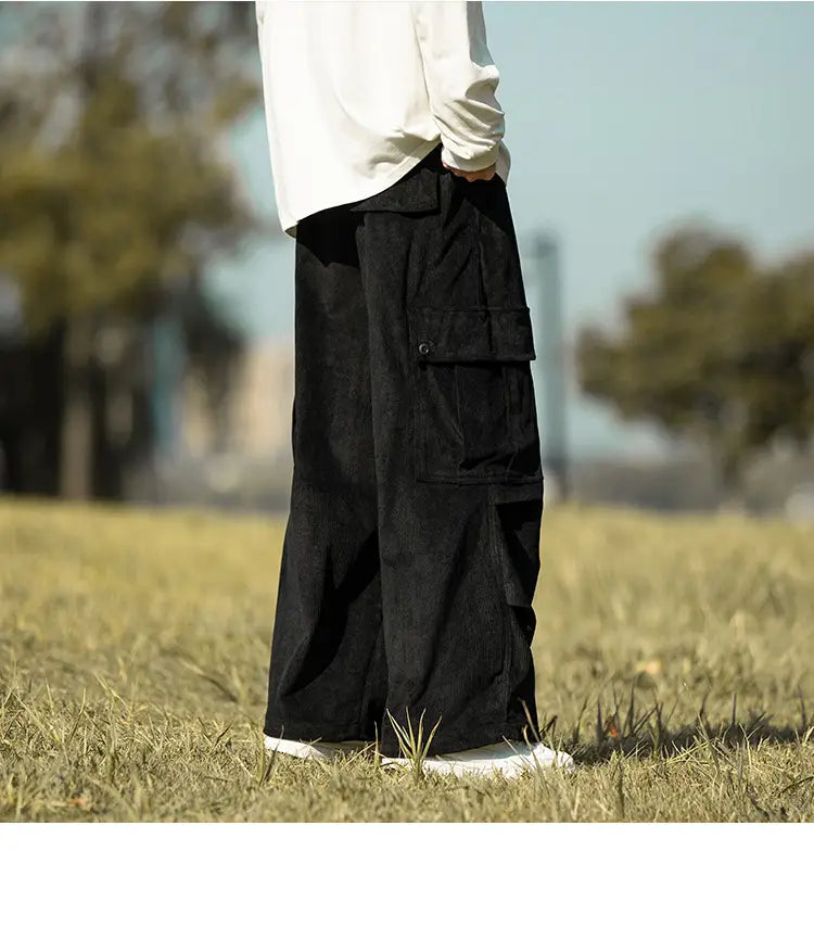 Men’s stylish wide-leg corduroy cargo pants with side pockets for casual comfort.