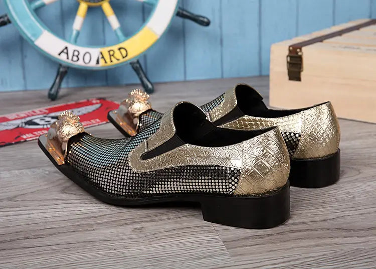 Metallic silver and black loafers with buckles for trendy pointed toe fashion.