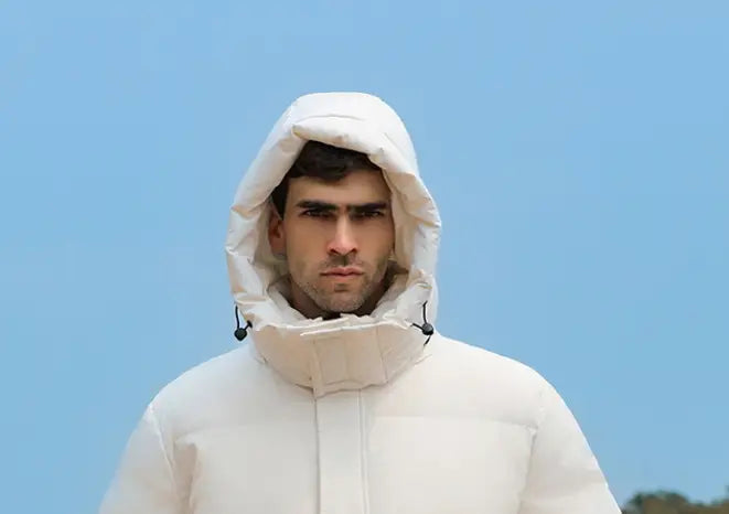 Men’s Luxury Padded Quilted Long Coat in white with a protective hood for winter style.