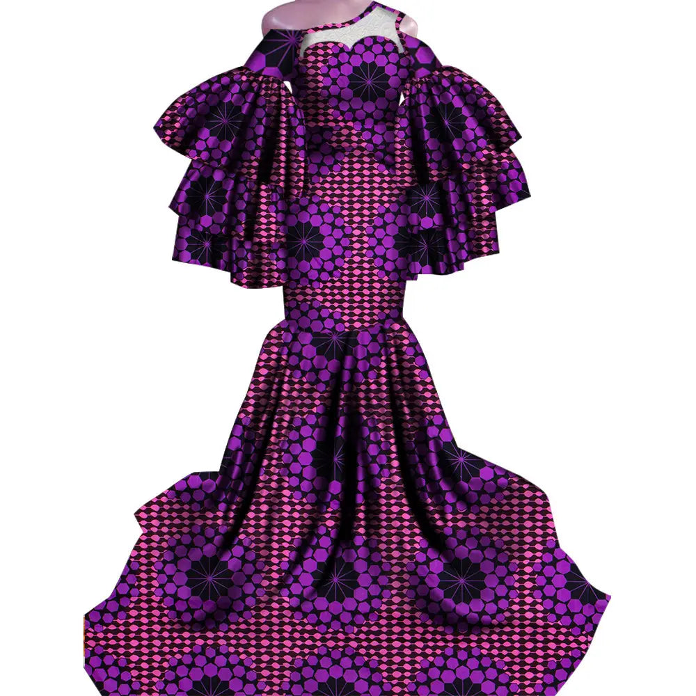 Vintage ladies African print traditional fishtail dress with ruffled sleeves, purple and black.