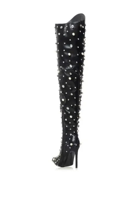 Black rhinestone encrusted thigh high boots with silver studs and spikes for a stunning look.