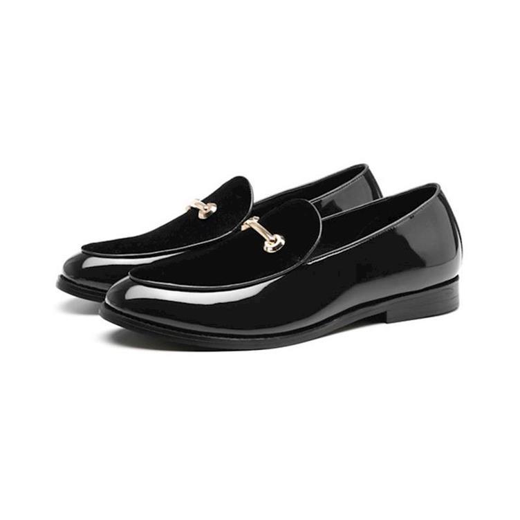 Shiny black patent leather loafers with metallic buckles for British Style Patent look.