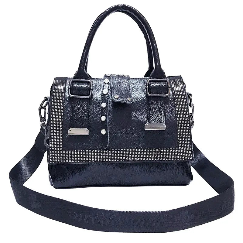 Black leather rhinestone encrusted large handbag with detachable strap for style.