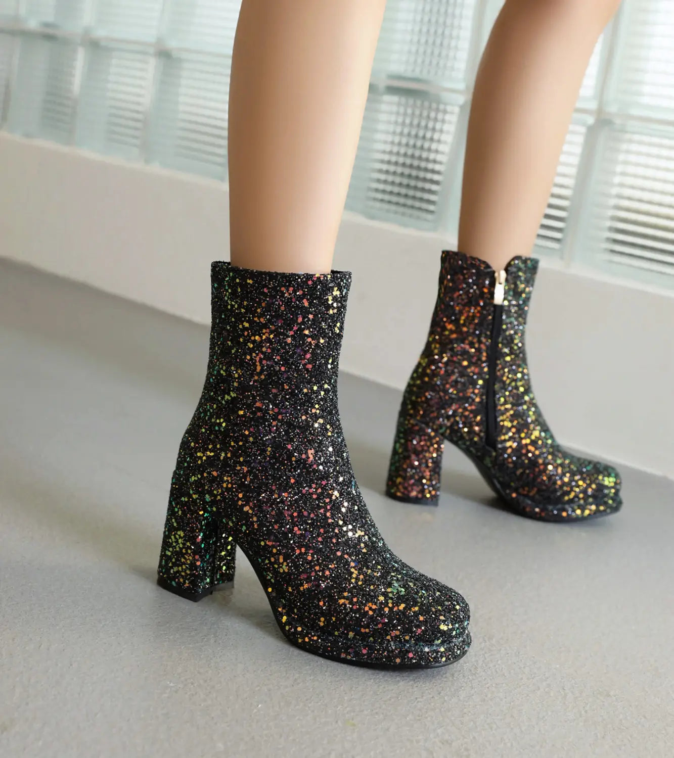 Sparkly black glitterthick high heel ankle boots perfect for Christmas parties!