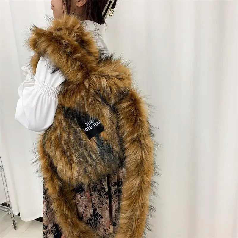 Faux fur vest in brown tones with black patch detail for stylish crossbody tote bag.