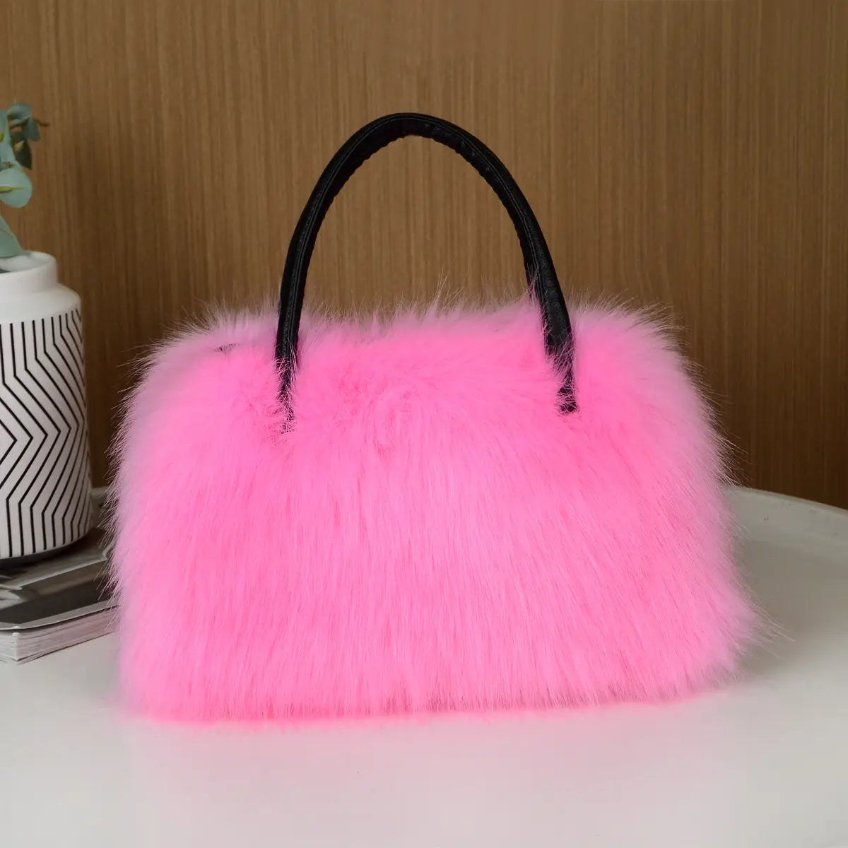 Pink Faux Fur Fluffy Boston Handbag with Black Handles for Winter Vibes.