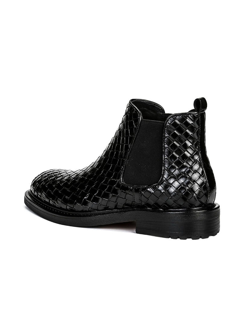 Black woven leather Chelsea boot with a chunky sole in men’s woven pattern short boots.