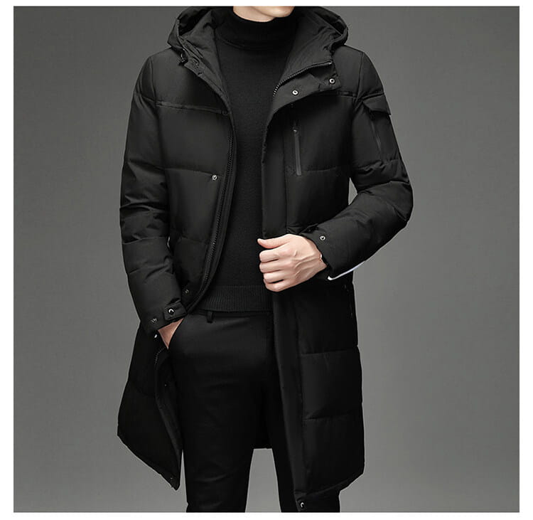 Black hooded winter parka with pockets and zipper, a meticulously crafted knee length coat with thermal insulation.