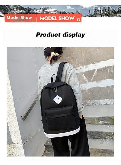 Black USB backpack with white diamond patch, perfect for computer travel and large capacity.