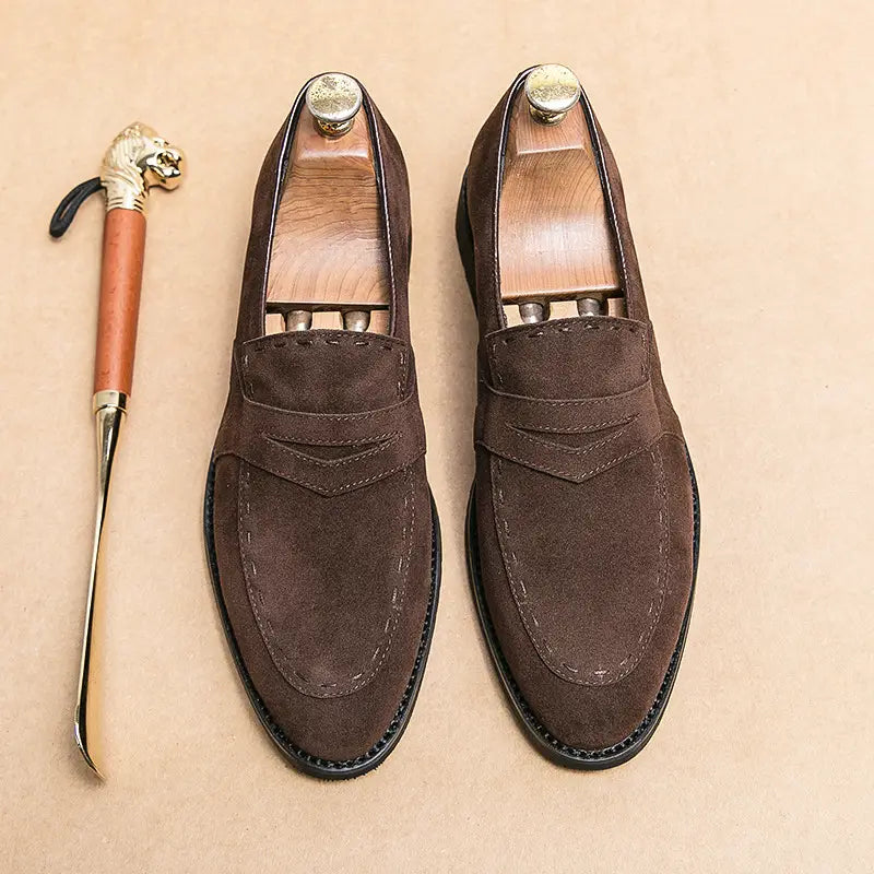 Brown suede pointed toe casual loafers with classic stitching detail for stylish everyday wear.