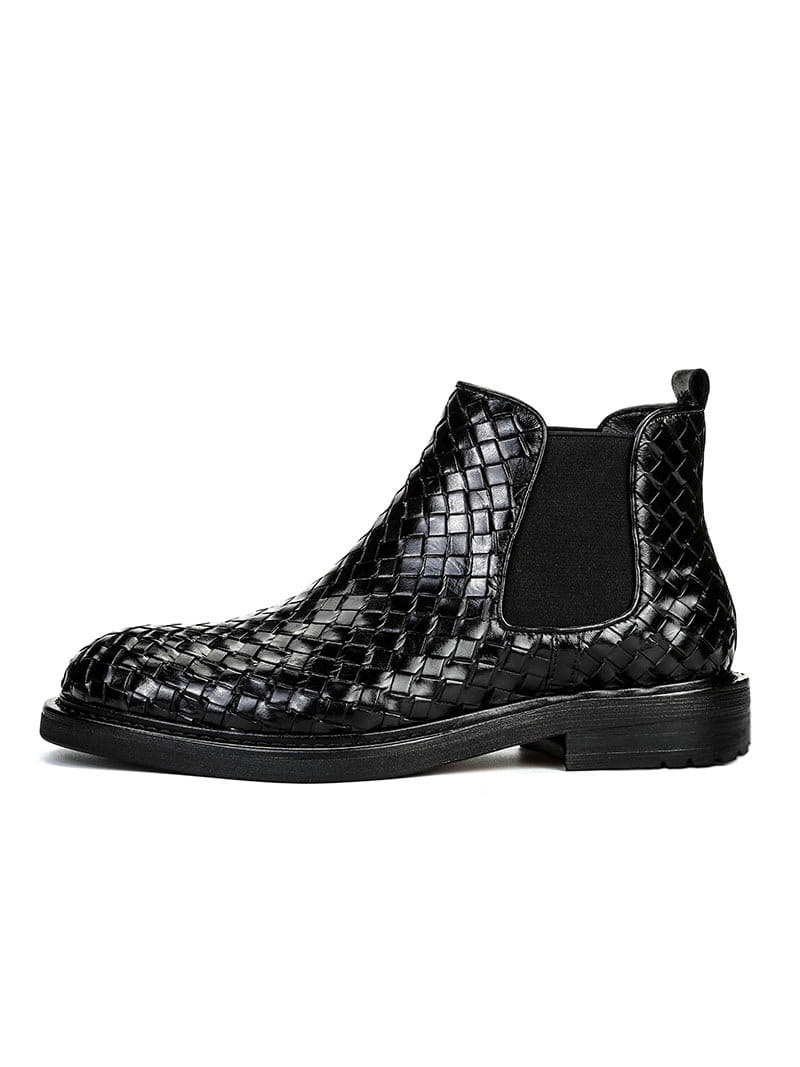 Black woven leather Chelsea boots with elastic side panels for men’s woven pattern style.