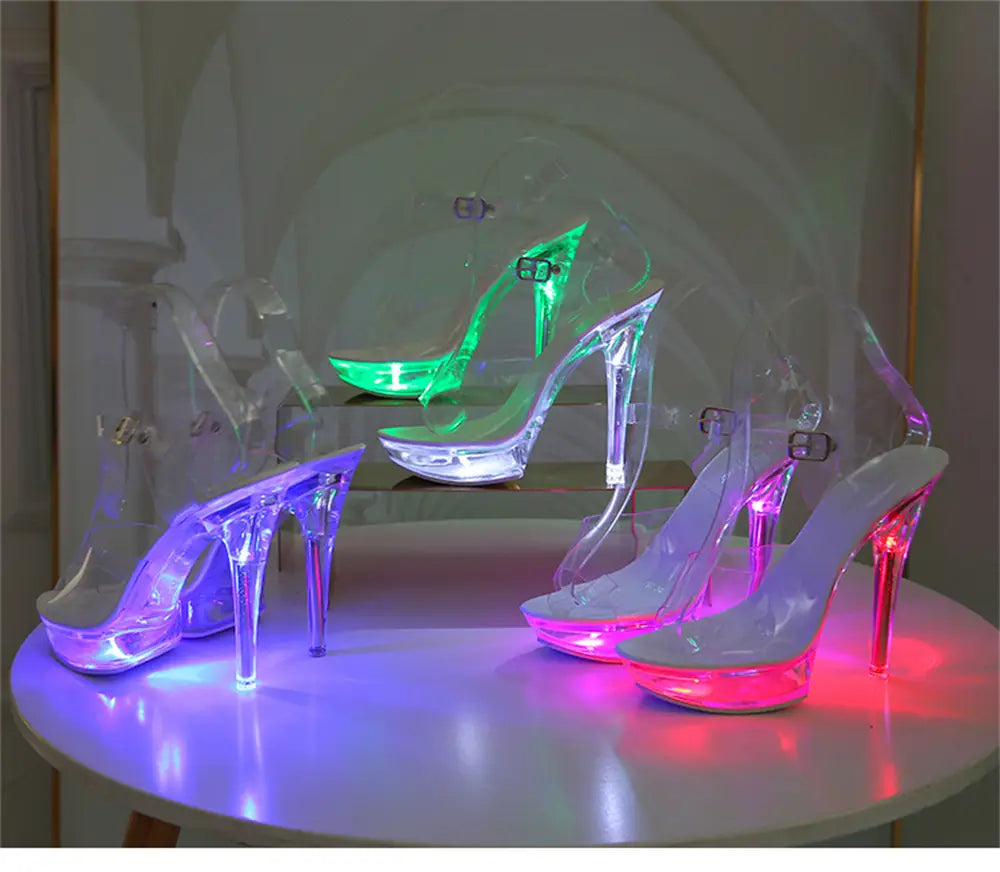 Clear Luminous Stiletto Platform sandals glowing with colorful LED lights in Neon Pink.