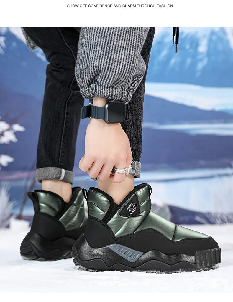 Chunky black winter boots with metallic panels and thickened warm rubber soles.