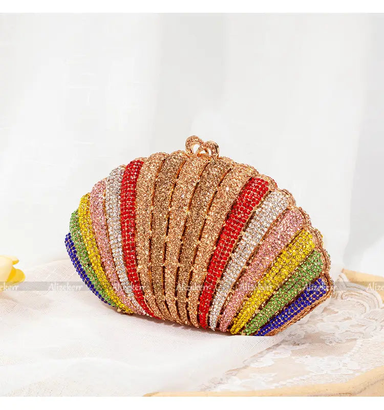 Rainbow Shell Rhinestone Evening Clutch purse with crystal stripes, perfect for glam nights.