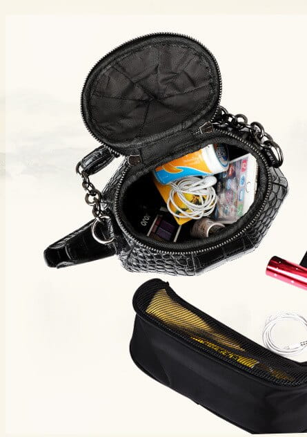 Sleek black zippered coin purse with chain, perfect for your Ladies Black Teapot Bag.