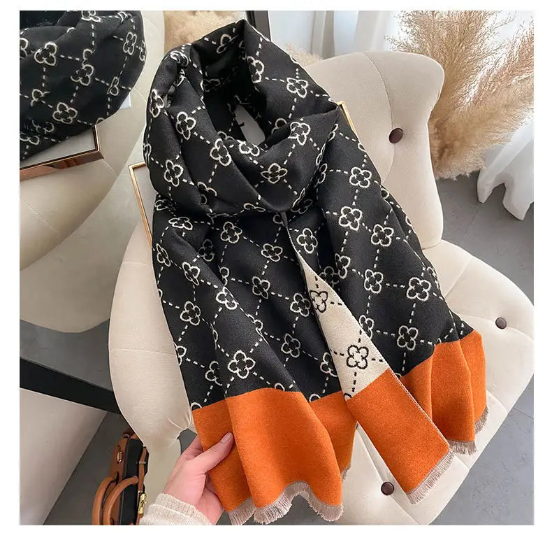 Black silk scarf with floral patterns and orange trim for the Exquisite Faux Cashmere Sunflower.