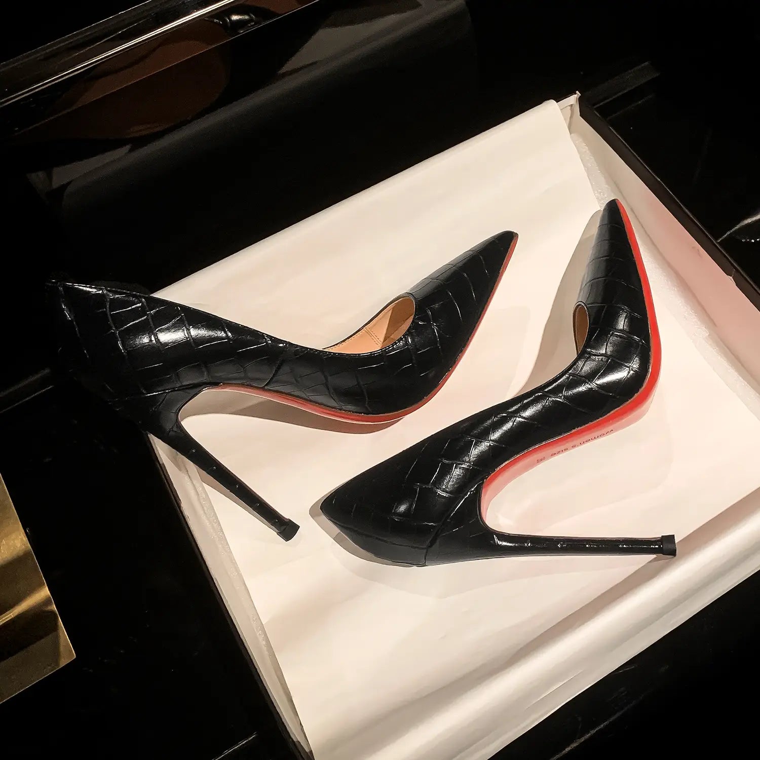 Stylish Black Patent Leather High Heels with Eye-Catching Red Soles for Women