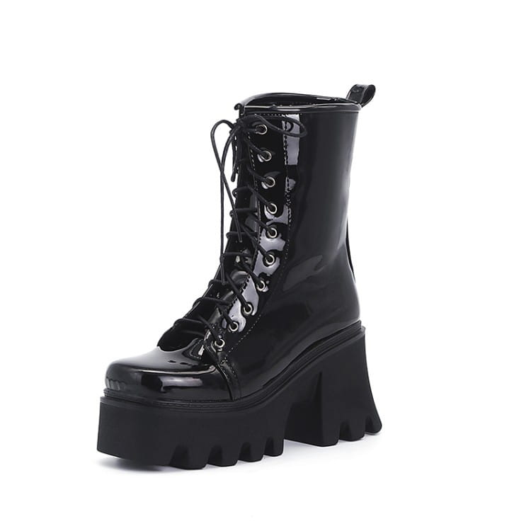 Black Patent Boots with Thick Heels, lace-up front, and chunky sole for a trendy look.