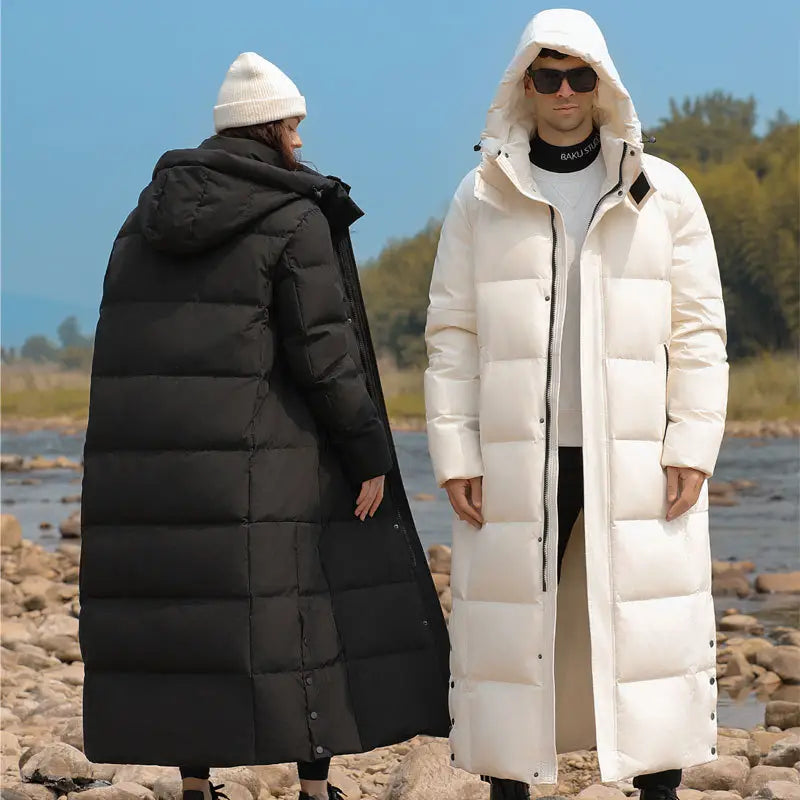 Two luxury padded quilted long coats in stylish black and white for men.