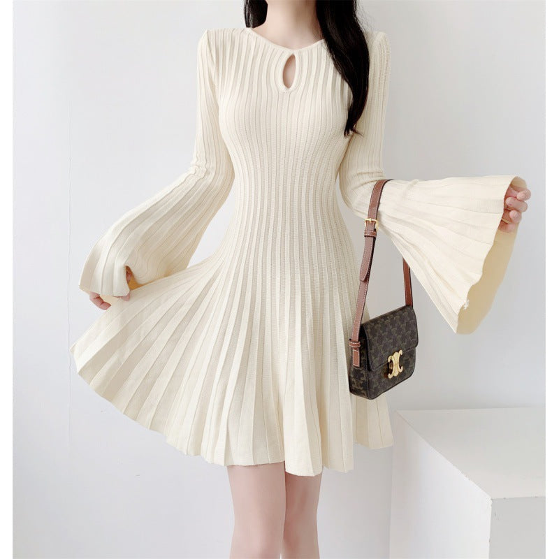 Ladies Bat Wing knitted dress with cinched waist and slimming A-line pleats