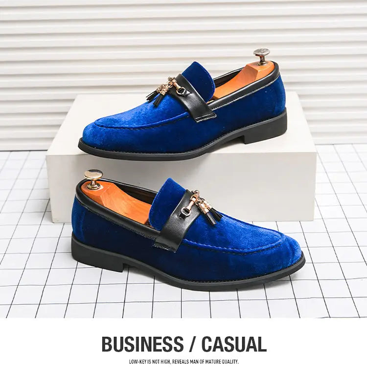 Royal blue velvet loafers with silver hardware for a stylish men’s British style velour moccasin.