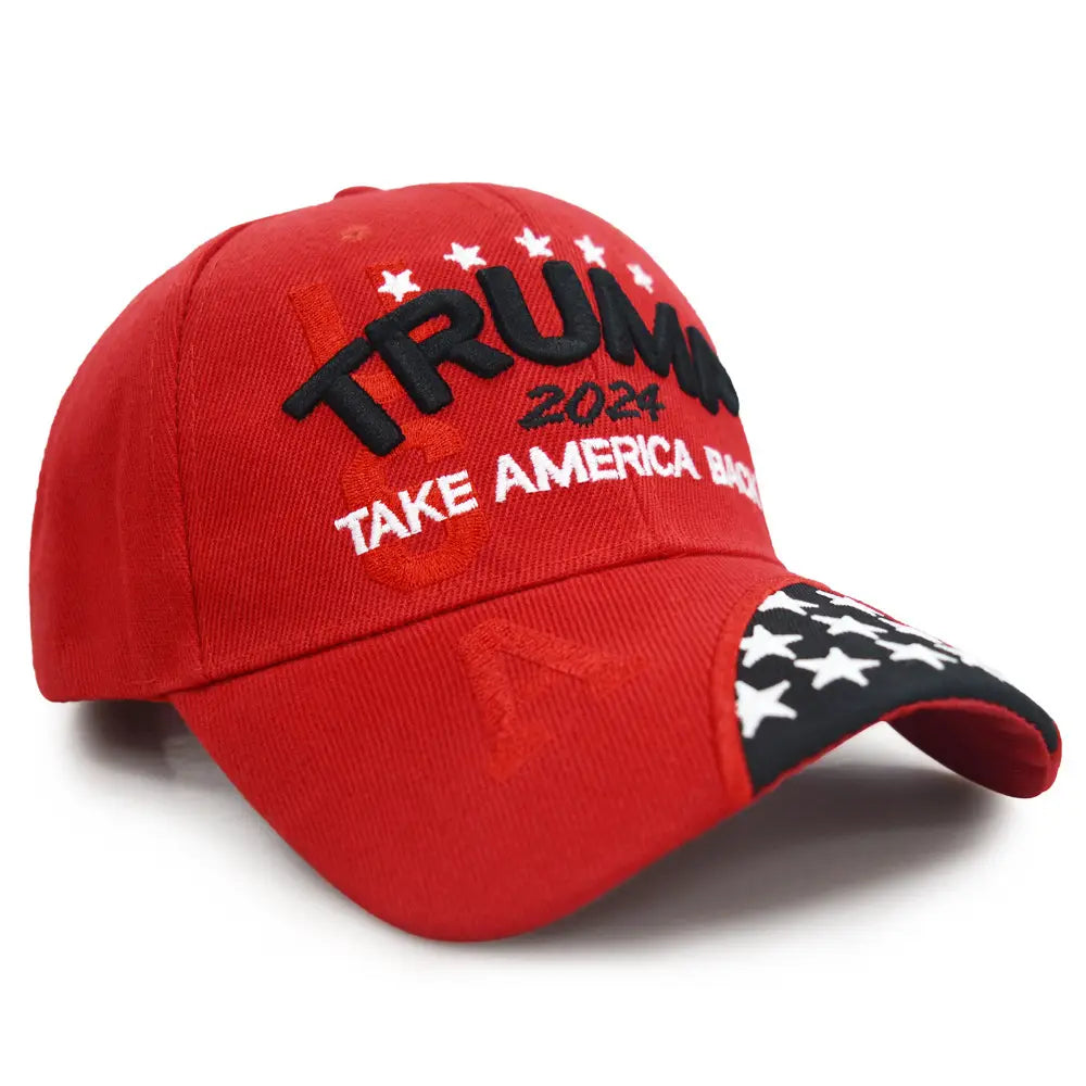 Red embroidered baseball cap featuring TRUMP 2024 and stars celebrating American values.