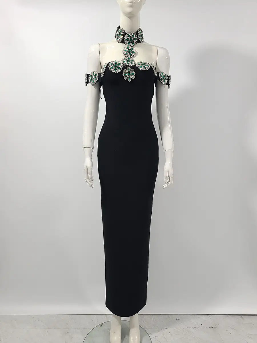 Elegant black evening gown with silver embellishments for a stunning bandage dress look.