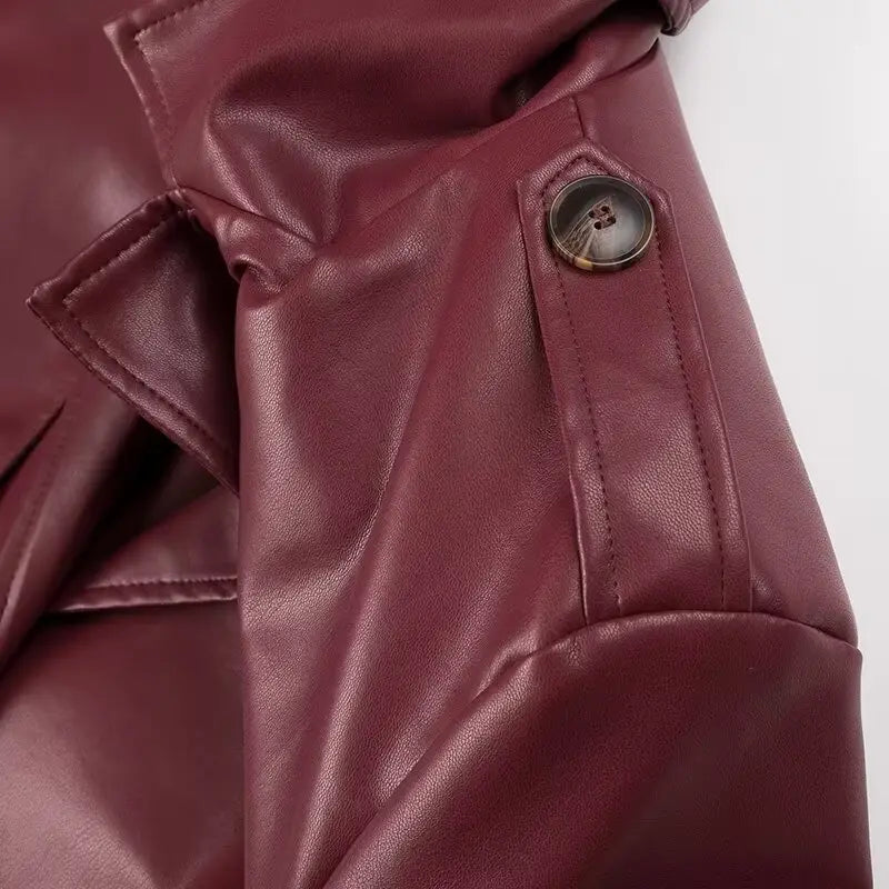 Burgundy faux leather windbreaker coat with stylish button detail for ladies.