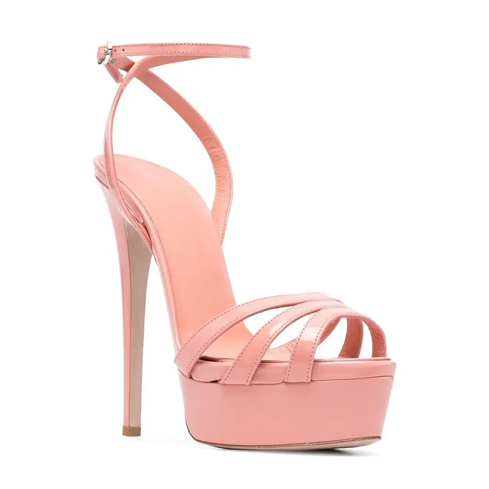 Pink platform sandals with ankle buckle and slim heels for a stylish look.