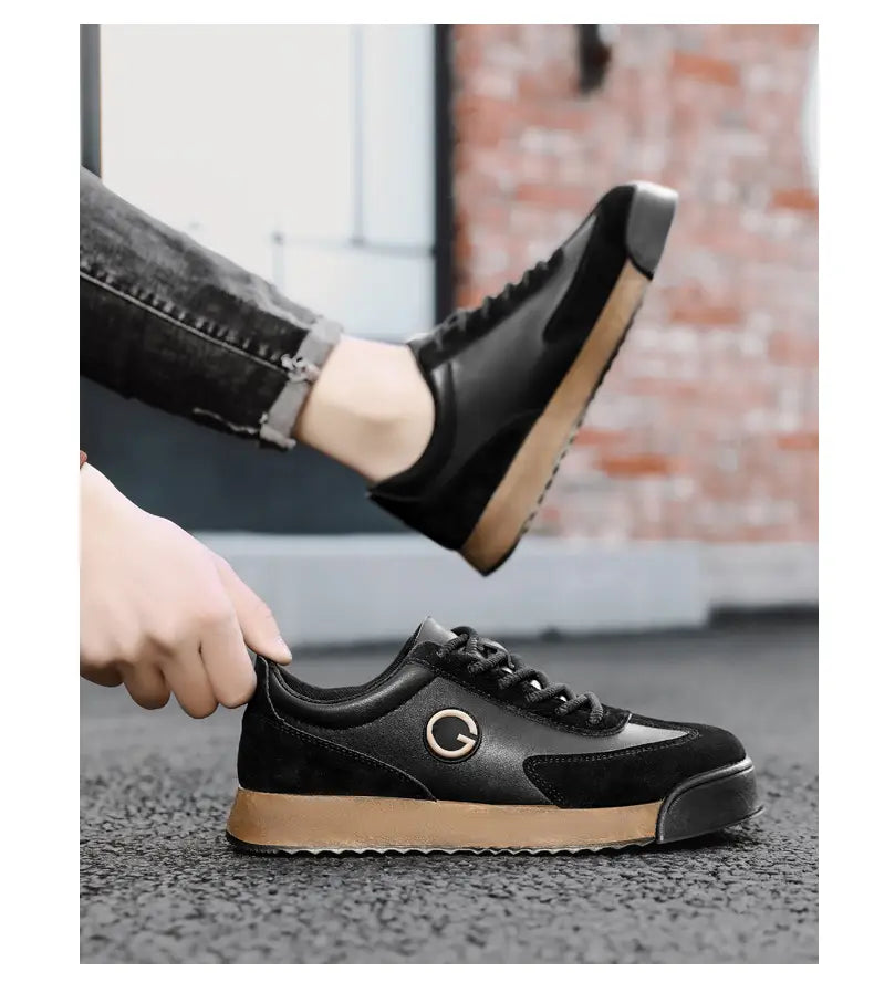 Black leather sneaker with gum sole, perfect men’s casual flat trainer for any occasion.