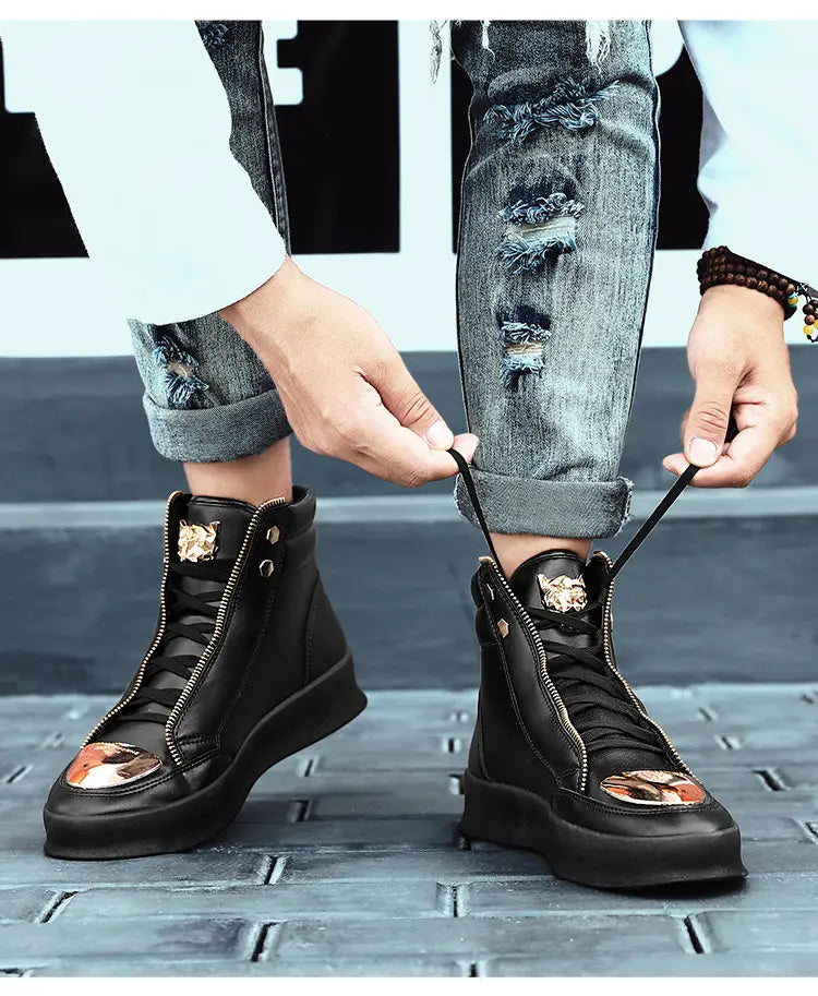 Black high-top casual street boots with metallic toe caps and zipper details.