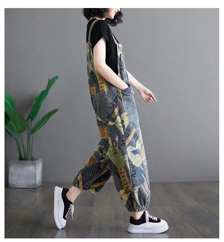 Loose fit retro printed denim dungarees with a cool camouflage pattern and sneakers.