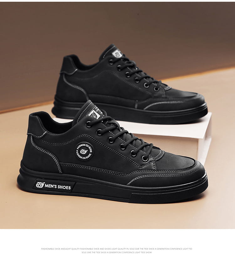 Black casual sneakers with white stitching, perfect men’s British style soft soled shoes.