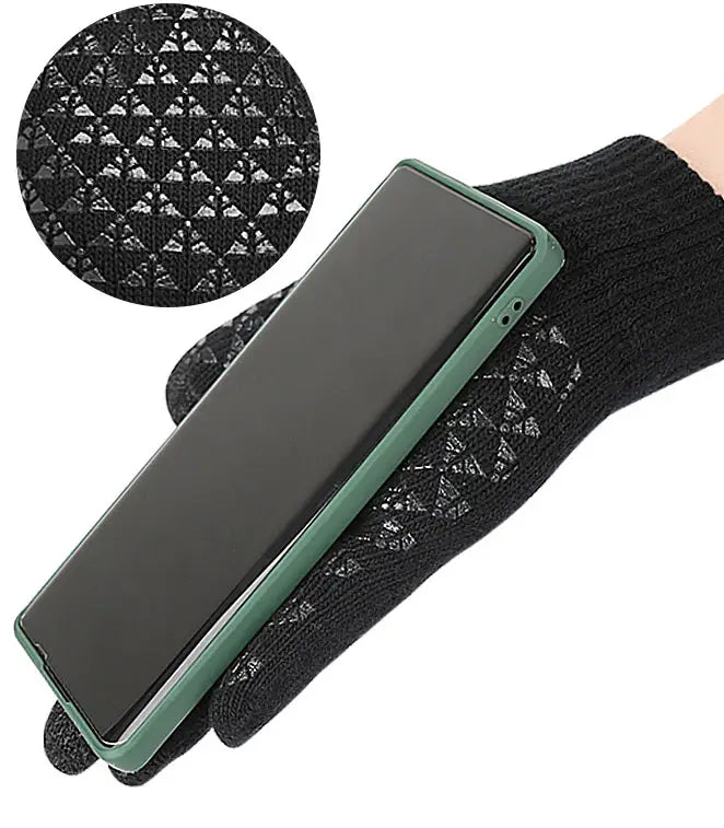 Black knit touchscreen glove using smartphone with green case, perfect for heated electric gloves.