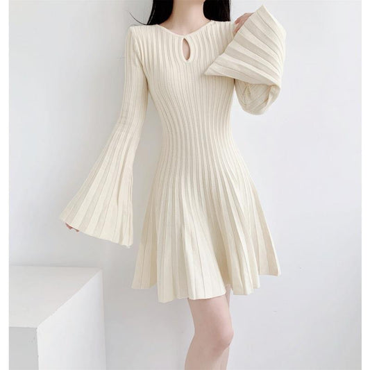 Ladies Bat Wing knitted dress with cinched waist and slimming A-line pleats