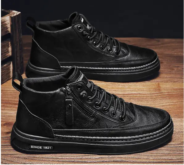 Black high-top sneakers with laces and zippers for trendy mens high casual shoes.