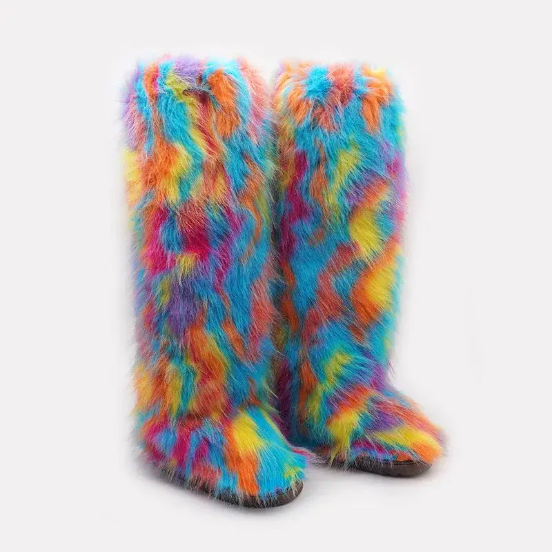 Colorful fluffy snow boots in blue, pink, orange, and yellow for stylish winter vibes.