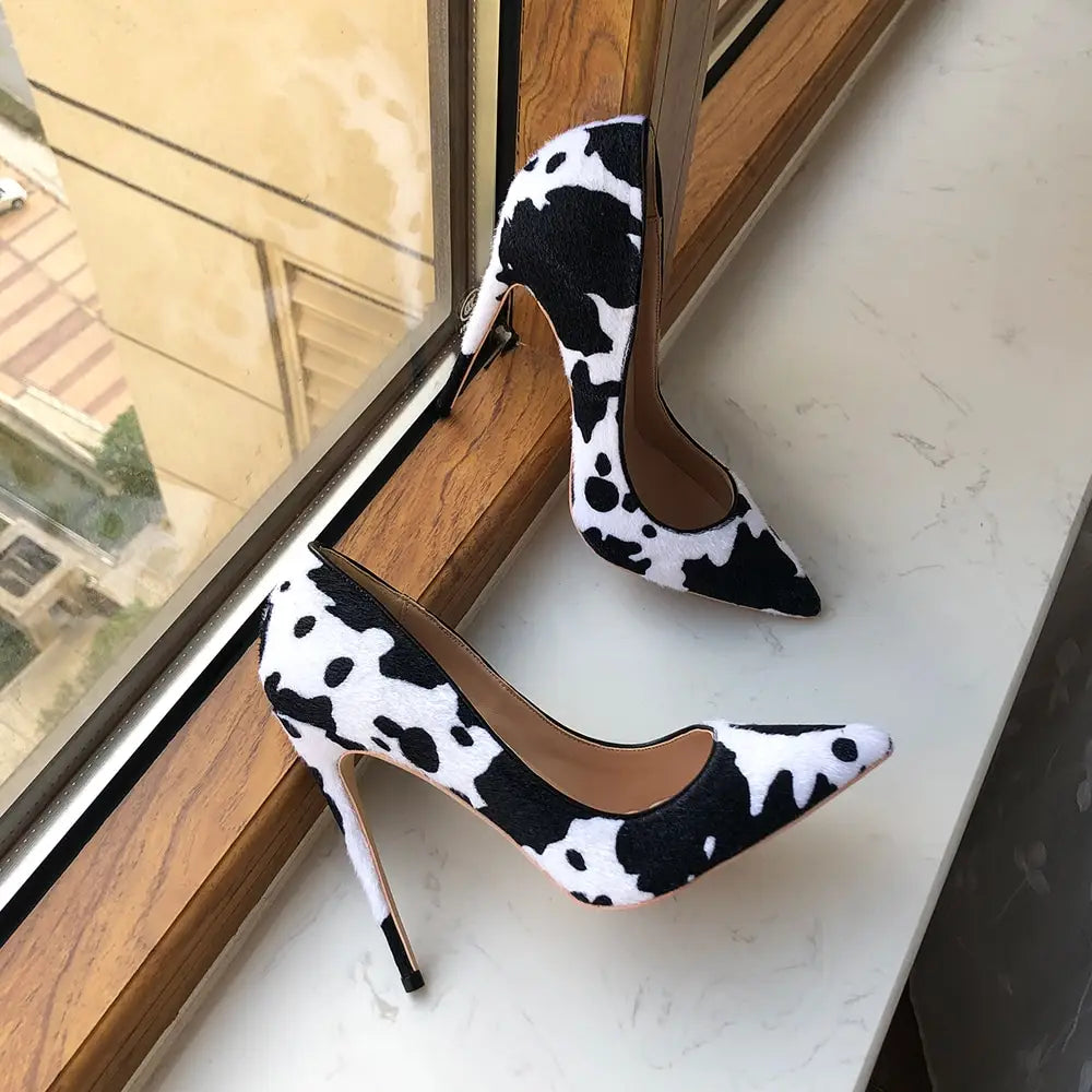 Cow Print Hairy Flock Pointed Toe High Heels with trendy black and white design.