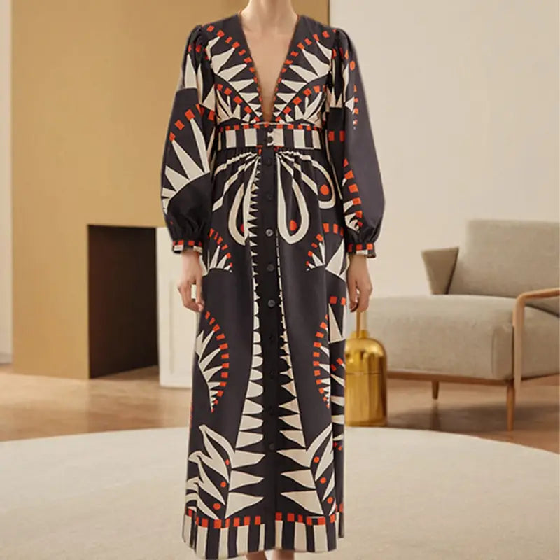 Long V Neck Maxi Dress featuring a bold classical style print and flattering empire waist.