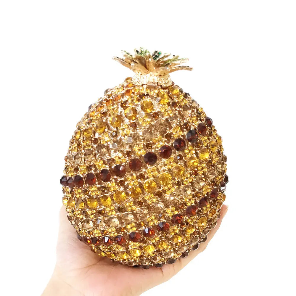 Glittering gold and amber rhinestone pineapple shaped crystal ornament for a diamante banquet bag