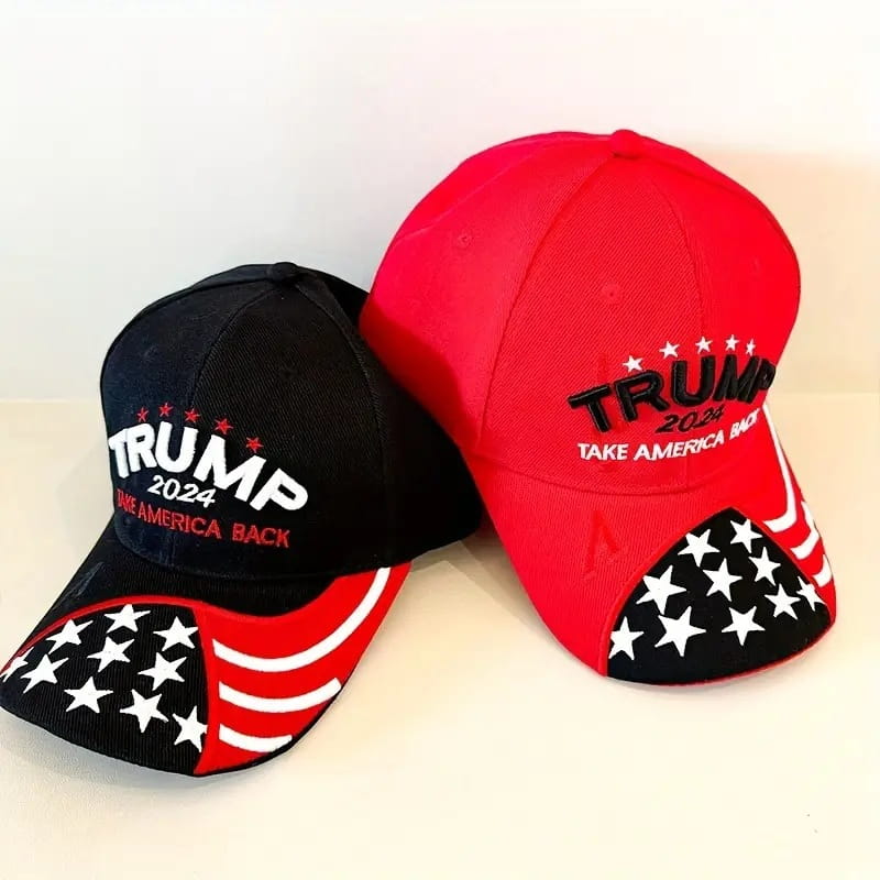 Two embroidered baseball caps with American flag designs and Donald Trump branding.